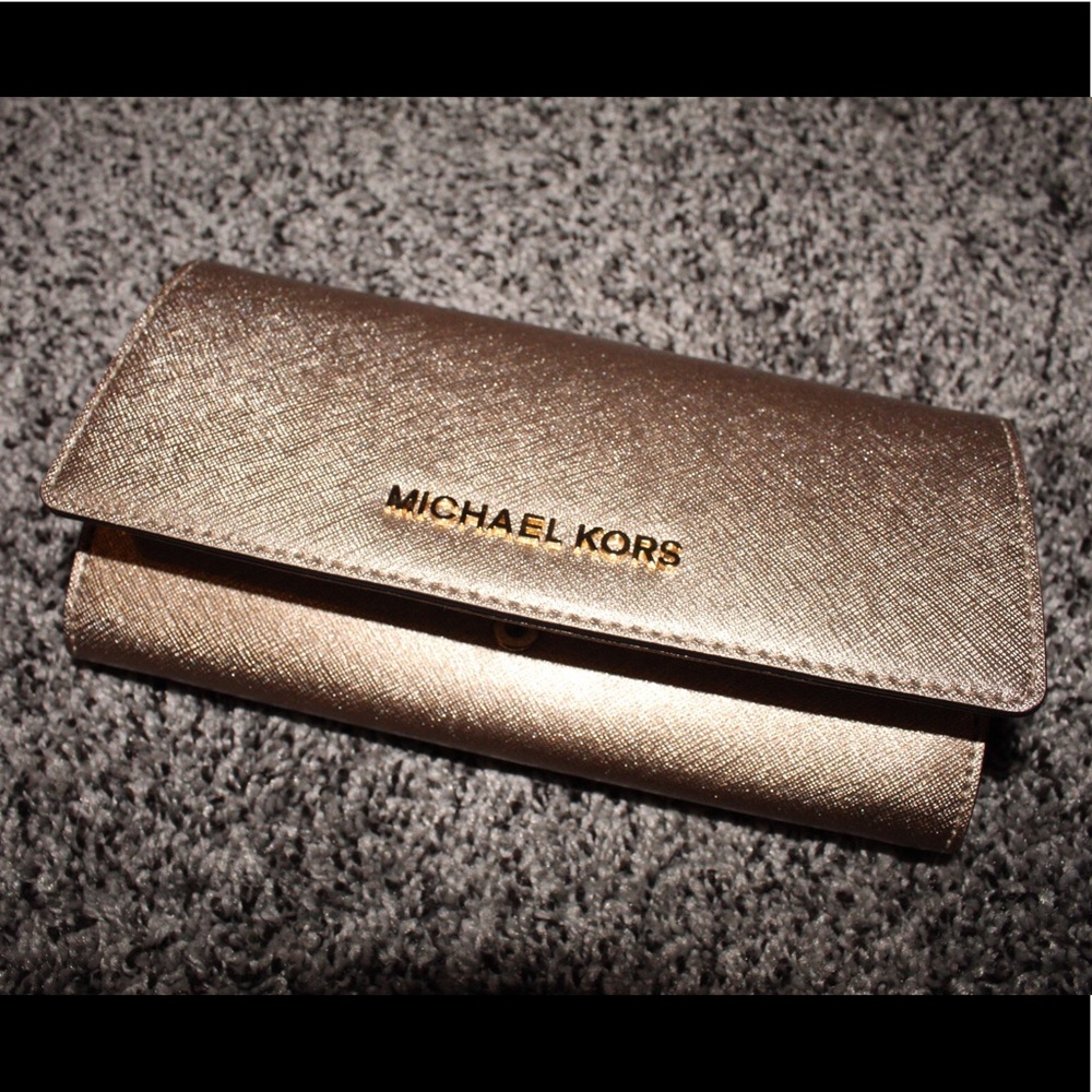 Michael Kors gold clutch wallet